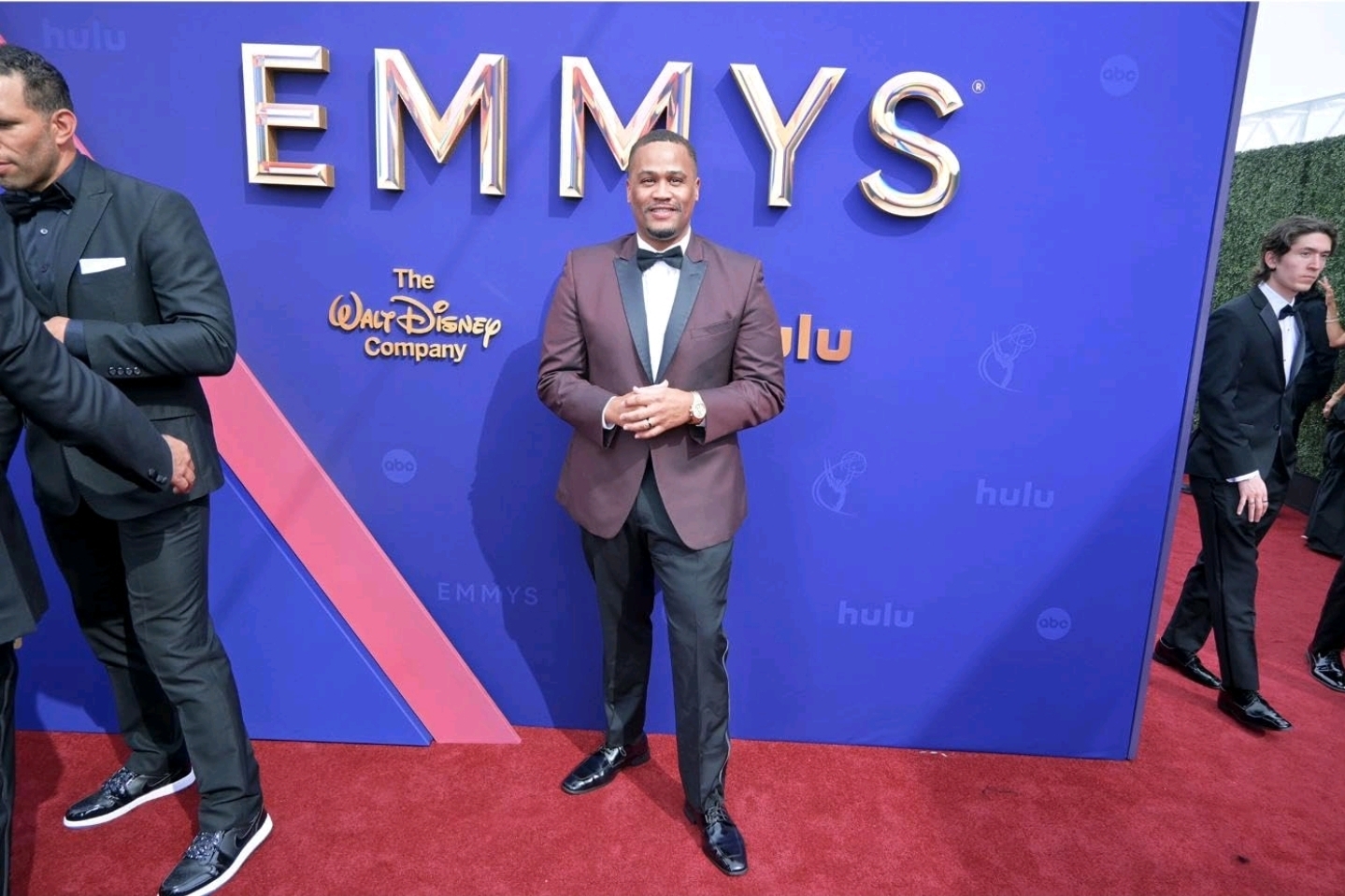E'Ian West on the Emmys red carpet at the Walt Disney Company and Hulu step and repeat